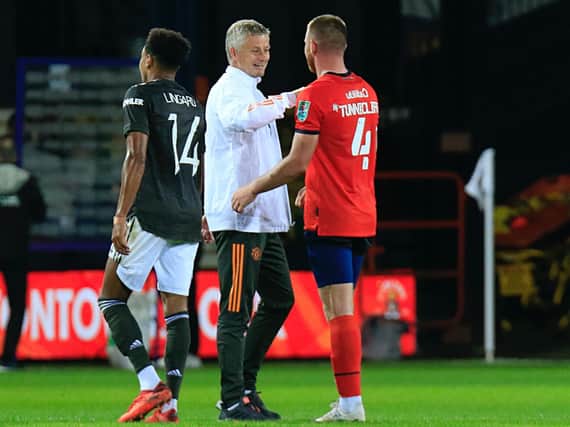 Manchester United boss Ole Gunnar Solksjaer with Luton's former Red Devils midfielder Ryan Tunnicliffe at the full time whistle