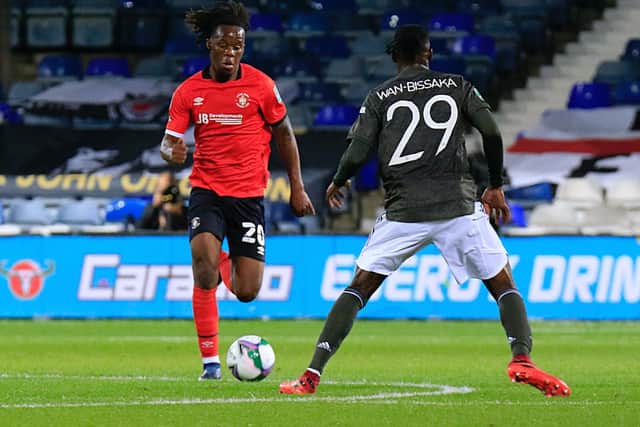 Peter Kioso goes on the attack against Manchester United at Kenilworth Road last night