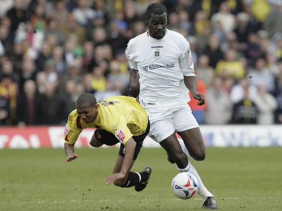 Enoch Showunmi sends Ashley Young tumbling during Luton's last derby clash with Watford in April 2006