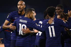Kylian Mbappe celebrates his winner for France this evening