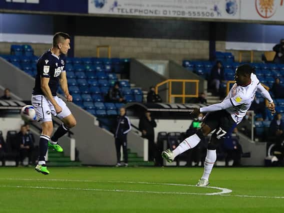 Pelly-Ruddock Mpanzu puts a shot wide for the Hatters this evening.