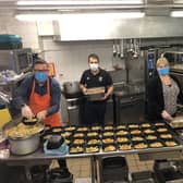 Luton Town Football Club staff prepare meals for St Matthew's Primary School and Luton Foodbank  (Credit:  LTFC)