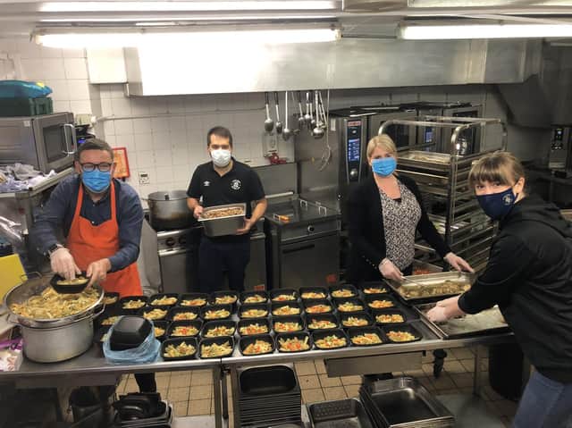 Luton Town Football Club staff prepare meals for St Matthew's Primary School and Luton Foodbank  (Credit:  LTFC)