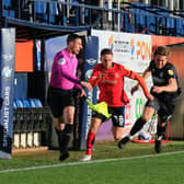 Jordan Clark scampers away on the right during today's 3-0 defeat to Brentford