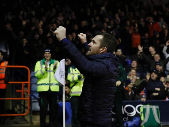 Nathan Jones celebrates a win with the Hatters fans during his first spell in charge
