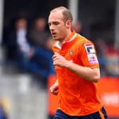 Former Hatter Jake Howells in action for Luton