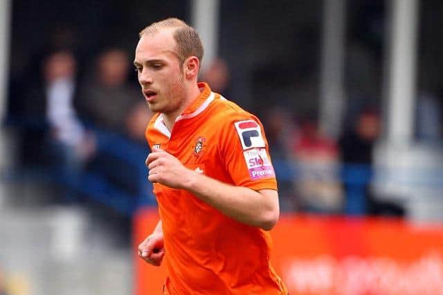 Former Hatter Jake Howells in action for Luton