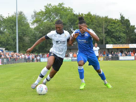 Josh Neufville in action for Luton Town during pre-season last term