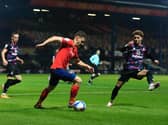 Tom Lockyer in possession against Norwich on Wednesday night