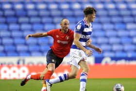 Danny Hylton gets close to a Reading defender during the Carabao Cup tie back in September