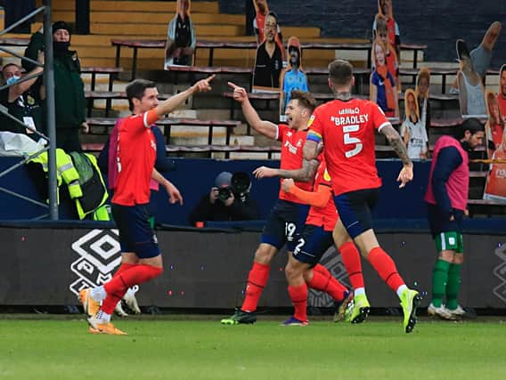 James Collins celebrates scoring a brilliant opening goal for the Hatters on Saturday