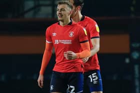 Kiernan Dewsbury-Hall celebrates Luton's 2-1 win over Bristol City