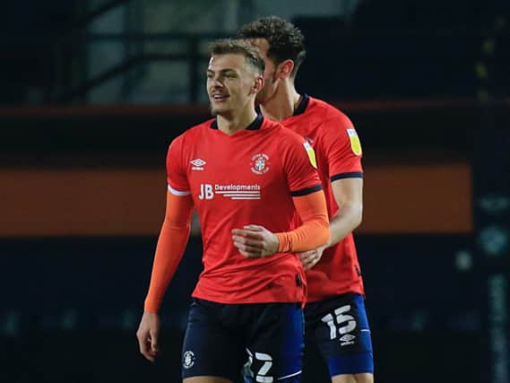Kiernan Dewsbury-Hall celebrates Luton's 2-1 win over Bristol City