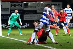 James Bree slides in during tonight's 2-0 defeat to QPR