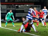 James Bree slides in during tonight's 2-0 defeat to QPR