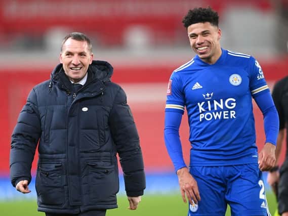 Former Luton left back James Justin with Leicester boss Brendan Rodgers