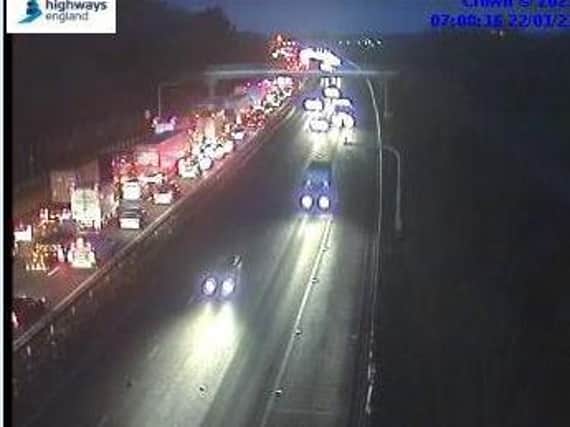 Highways England jam cams showed traffic queuing on the M1 heading towards Milton Keynes on Friday morning