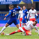 Ryan Tunnicliffe makes a sliding challenge during Luton's 3-1 FA Cup defeat to Chelsea