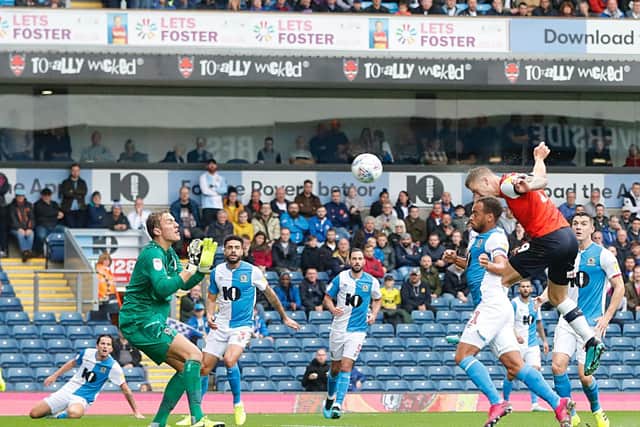 James Collins heads Luton in front against Blackburn Rovers last season