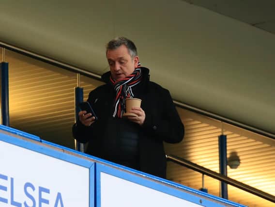 Luton chief executive Gary Sweet takes his seat at Chelsea for the FA Cup tie recently
