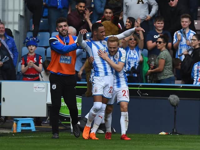 Tom Ince celebrates scoring a late winner for Huddersfield against Watford during his time with the Terriers