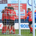Luton celebrate James Collins' opening goal against Huddersfield