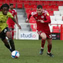 Peter Kioso tracks back for Northampton in their goalless draw at Accrington