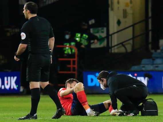 Tom Lockyer had to go off after suffering an ankle injury this evening