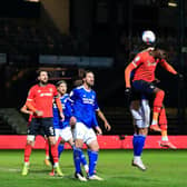 Elijah Adebayo flicks the ball on against Cardiff on Tuesday night