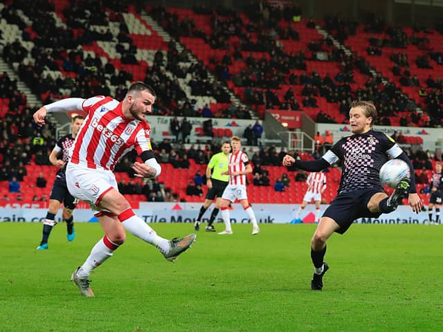 Luke Berry attempts to block a clearance during Luton's 3-0 defeat at Stoke last season