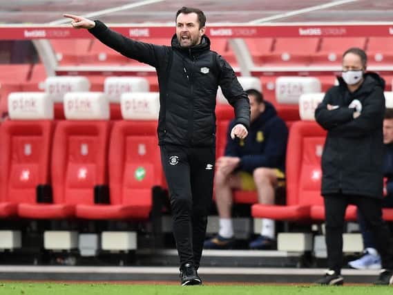 Hatters boss Nathan Jones saw his side easily beaten by Stoke