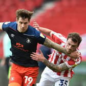 James Collins battles for possession against Stoke