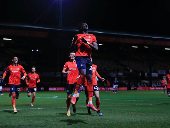 Elijah Adebayo celebrates scoring his goal against Millwall on Tuesday night