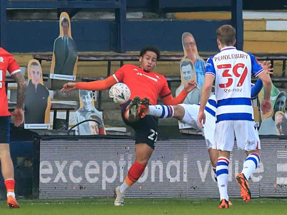 Sam Nombe goes for the ball against Reading in his only start for the club