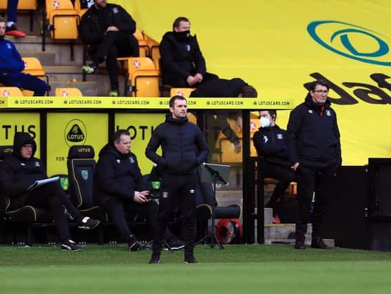 Town boss Nathan Jones watches on at Norwich last weekend