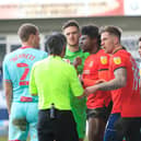 Luton have words with referee Darren Bond during their 1-0 defeat to Swansea on Saturday
