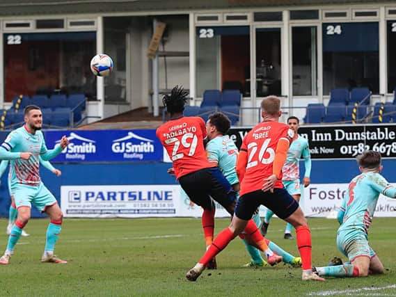 Elijah Adebayo is barged over during Town's 1-0 defeat to Swansea on Saturday