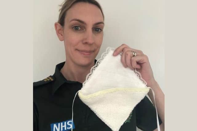 Jenni McClagish, patient safety specialist with EEAST, with a cuddle pocket