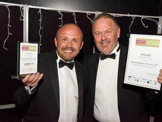 Jonathan and Chris Wilkinson-White with their Best Bed and Breakfast Tourism Excellence Award.