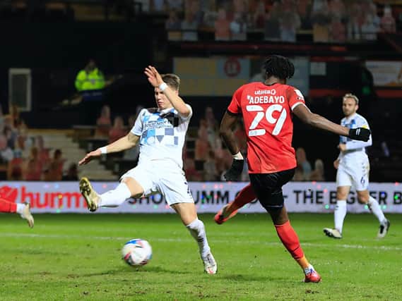 Elijah Adebayo goes for goal against Coventry