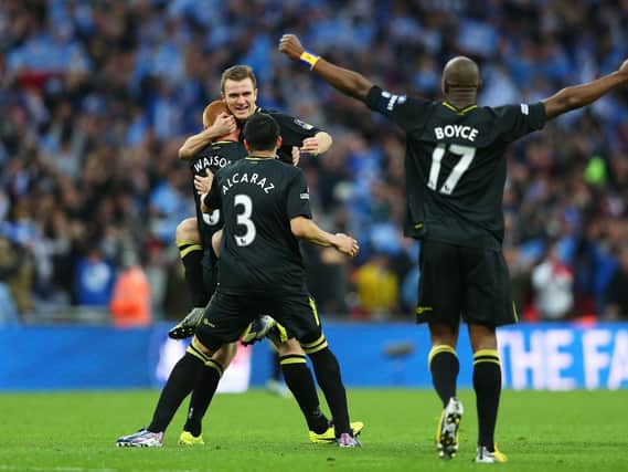 Emmerson Boyce celebrates Wigan's FA Cup win over Manchester City with Callum McManaman in 2013