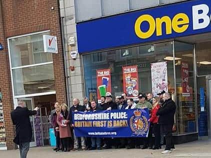 Britain First taunted Bedfordshire Police with a banner during their protest