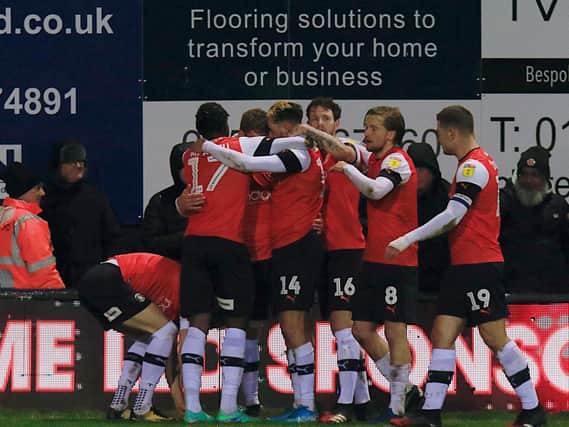 Luton players celebrate going 2-0 up against Brentford recently
