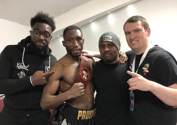 Victorious: Kay Prosper with Nicholas Prempeh, Xavier Miller and JP Smith after his win over Bilal Rehman