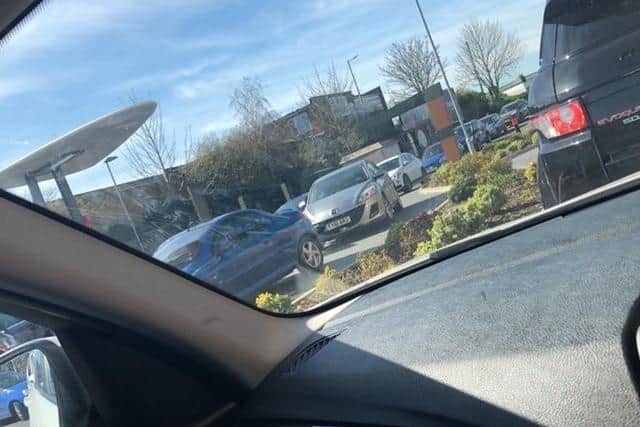 Traffic queues outside McDonald's in Chaul End