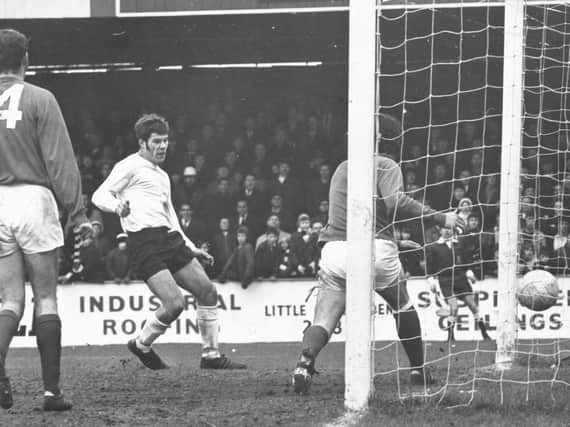 Malcolm Macdonald scores one of his hat-trick goals against Reading back on March 28, 1970
