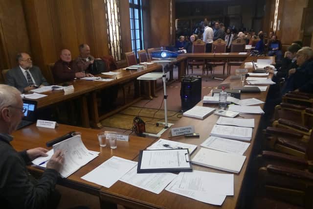 A meeting of Luton's development control committee last October