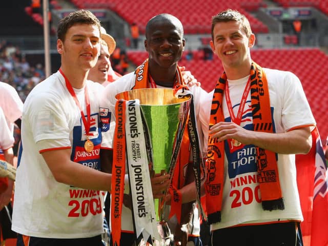 Tom Craddock celebrates the JPT victory with fellow goalscorers Chris Martin and Claude Gnakpa