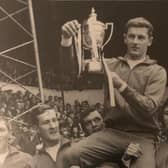 Terry Branston lifts the Division Four title for Luton in 1968