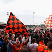 Luton Town fans celebrate promotionb back to the Football League in April 2014